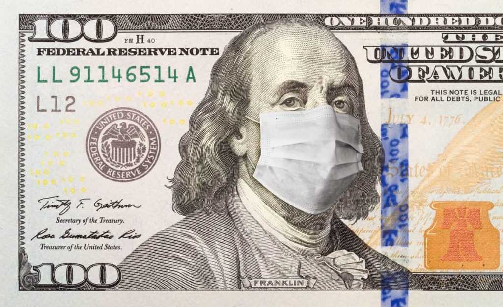 One Hundred Dollar Bill With Medical Face Mask on George Washington.