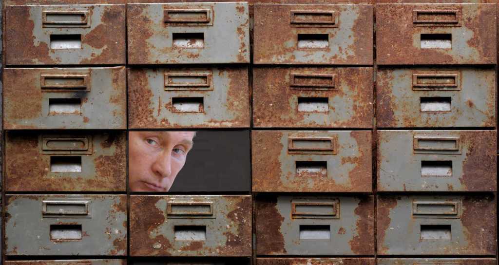 Old rusty metal closet with pullout drawers