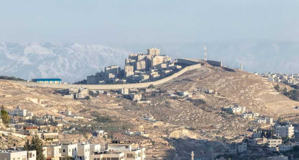 The Israeli  security fence separating Israel from the West Bank of Jordan - Judea and Samaria