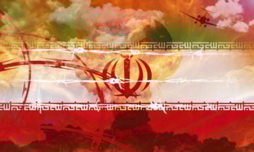 Barbed wire,  plane silhouette, and atomic bomb explosion on the background of the Iranian flag.