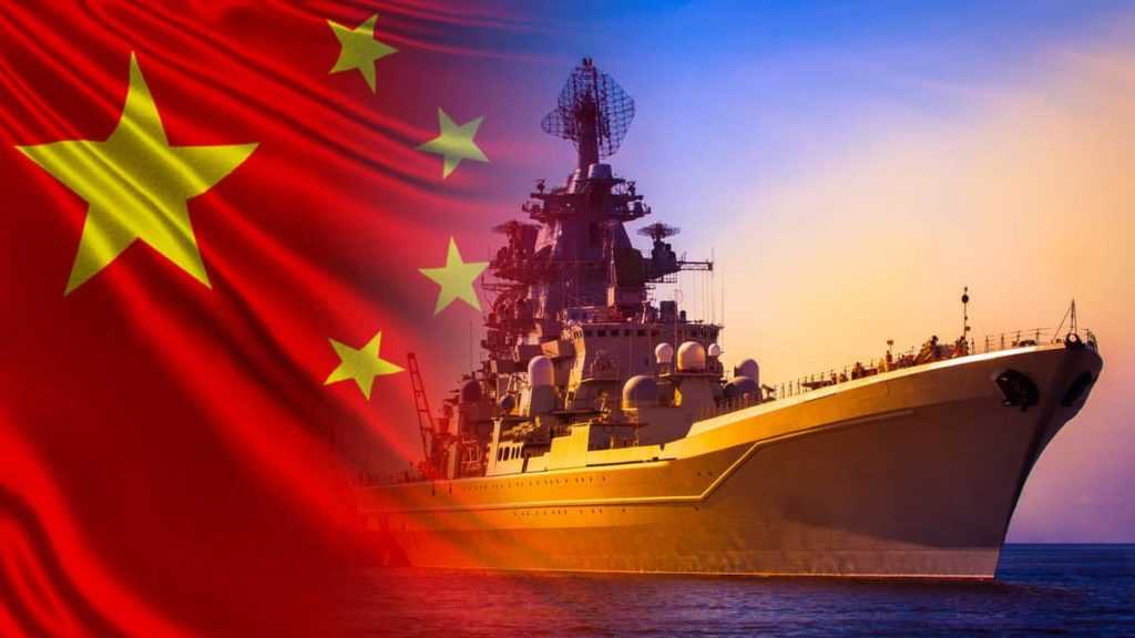 Warship close-up on the background of the Chinese flag. Protection of the water borders of the Republic of China. China's Navy. The Chinese fleet. Equipment of the Chinese army.