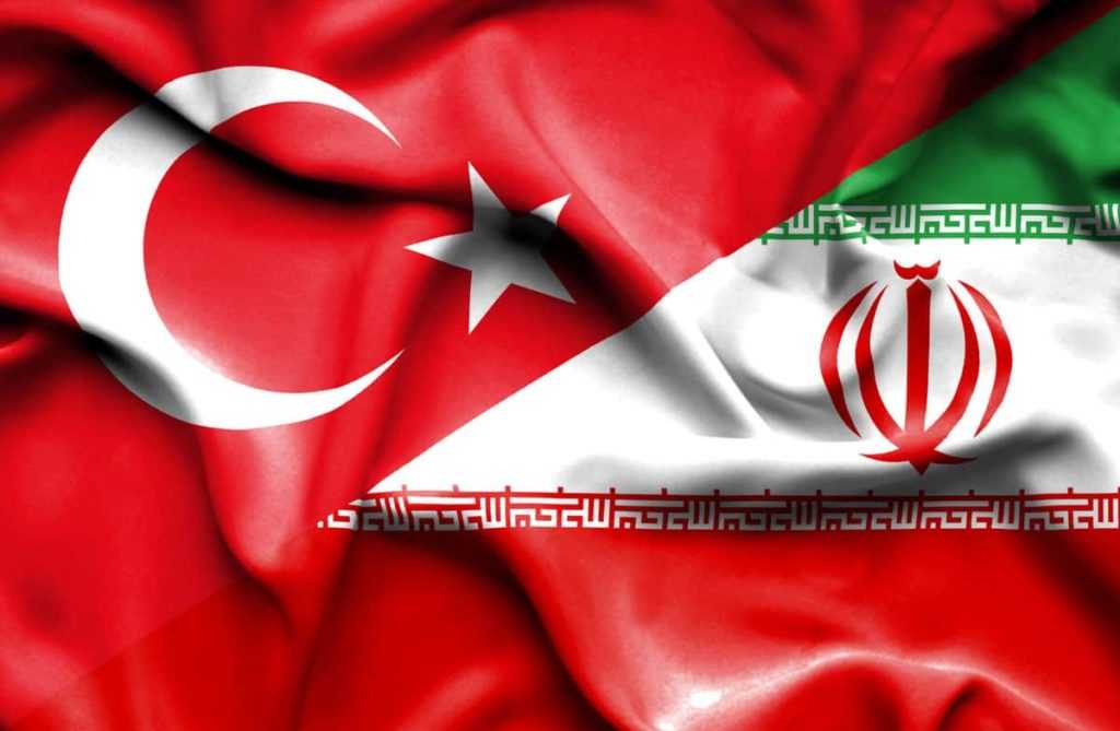 Waving flag of Iran and Turkey