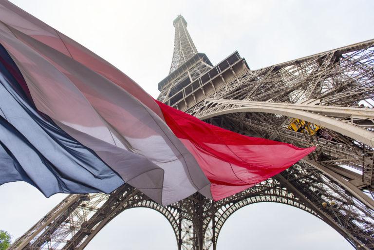Eiffel Tower and French Flag, concept picture about political situation in France and terrorist attack