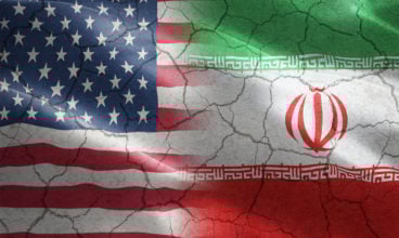 Cracked Flag of United States of America against Iran - indicates partnership, agreement, relationship, military and conflict between these two countries