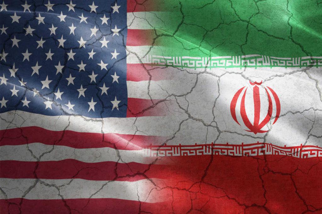 Cracked Flag of United States of America against Iran - indicates partnership, agreement, relationship, military and conflict between these two countries