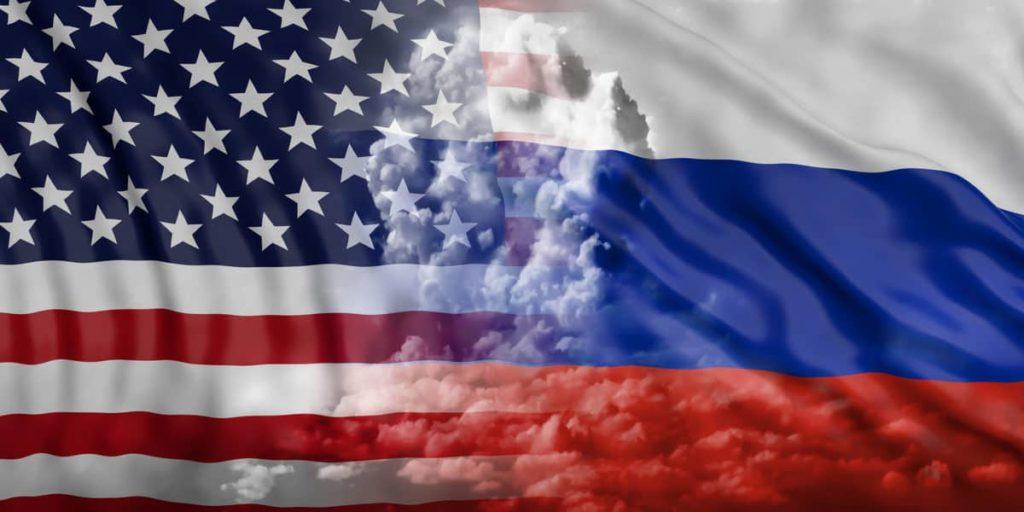 USA and Russia nuclear threat. Nuclear cloud on America and Russian flags background. 3d illustration