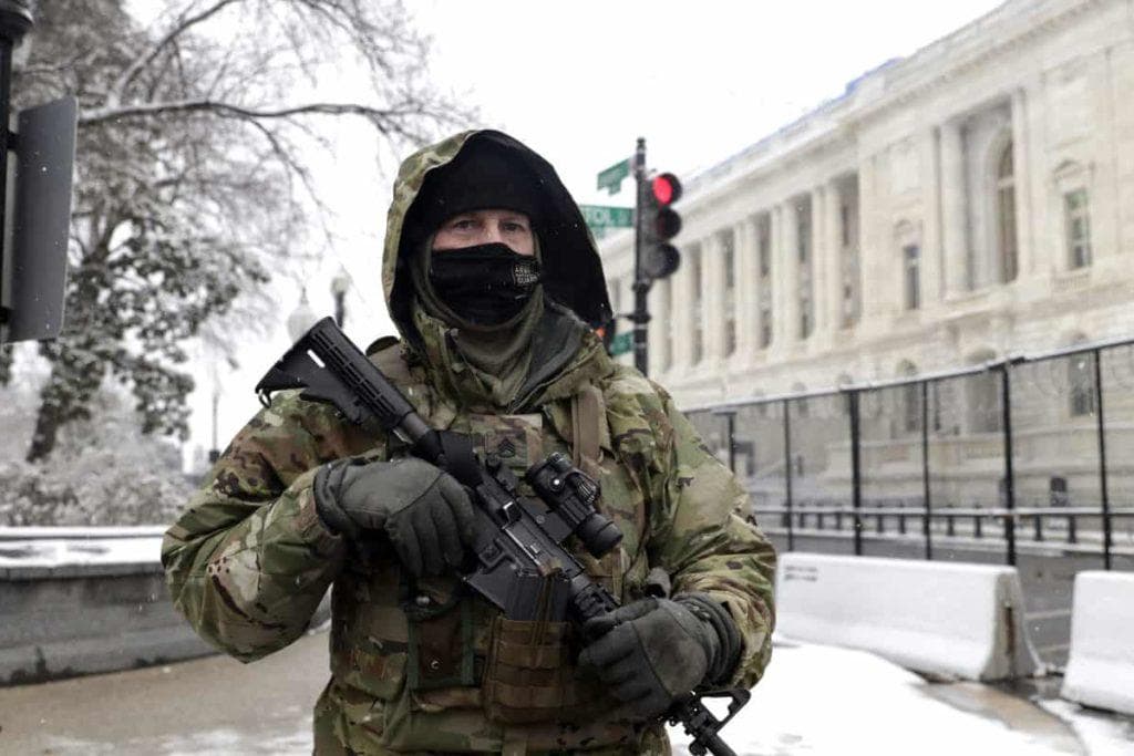 Guard Soldiers Work a Snowy Day at the US Capitol