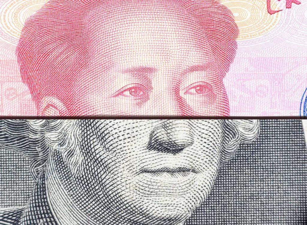 Trade war / trade tension between US and China, financial concept : Notes of USA and China with faces of President G Washington and Mao Zedong, depicts trade conflict between Washington and Beijing