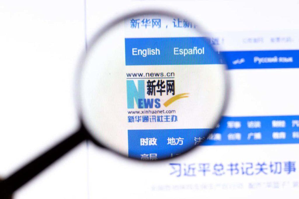 Los Angeles, California, USA - 18.02.2020: Xinhua News Agency website page with close up logo. Xinhuanet.com site icon on screen, Illustrative Editorial