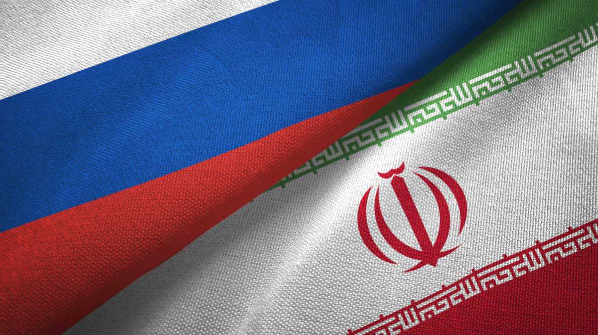 Russia and Iran two flags textile cloth, fabric texture