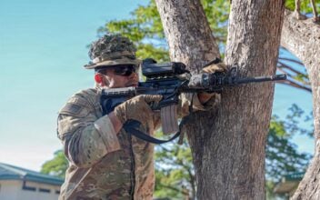 Pfc. Victor Salazar, of the U.S. Army’s 25th Infantry Division, uses an M4 carbine outfitted with a counter-drone during training at Fort Magsaysay, Philippines, May 8, 2026. (Christopher Moorehead/U.S. Army)